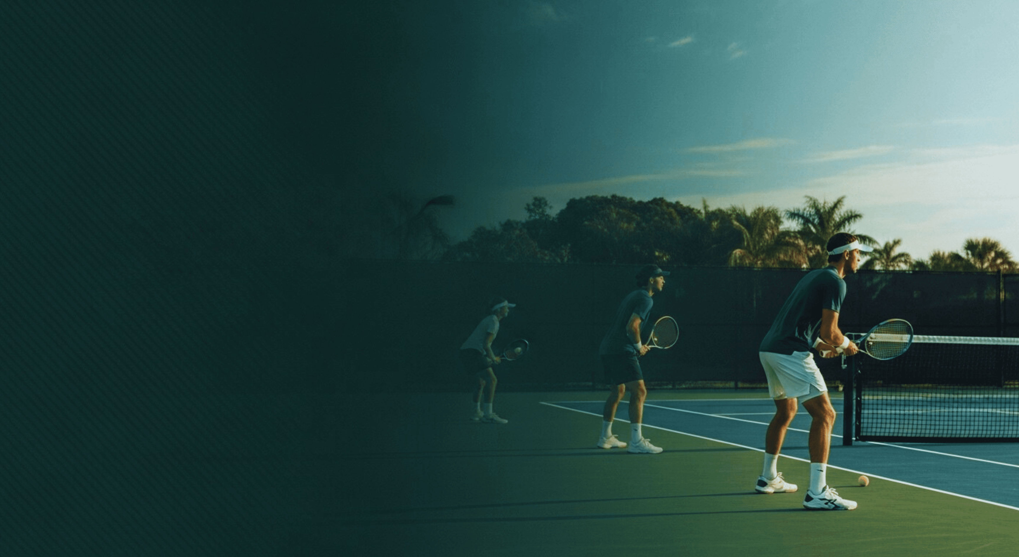 Tennis player preparing to serve on court
